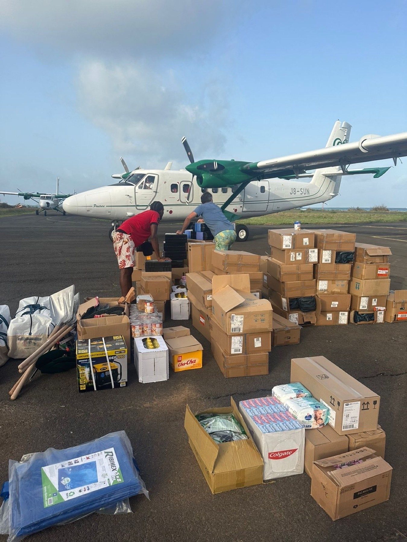 Twin Otter plane loaded with early relief supplies for Union Island
